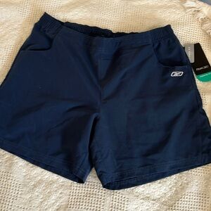 RBK women’s shorts size Large NWT navy blue, elastic waist in the sides and back